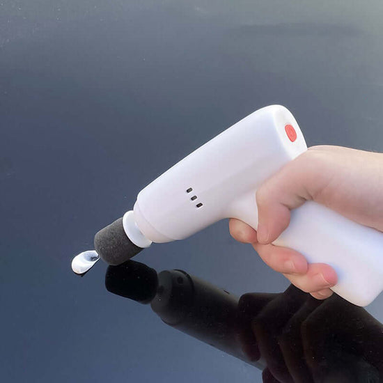 Wireless Charging Polishing Machine Car Scratch Repair Machine in hand, polishing a shiny black surface.